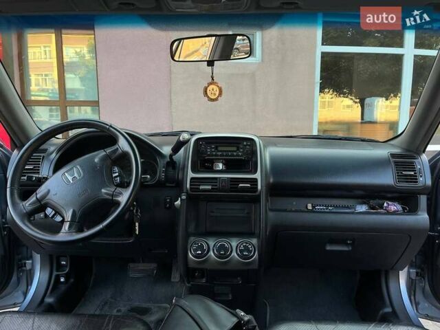 Серый Хонда СРВ, объемом двигателя 2 л и пробегом 251 тыс. км за 7500 $, фото 6 на Automoto.ua