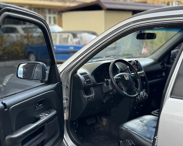 Серый Хонда СРВ, объемом двигателя 2 л и пробегом 290 тыс. км за 5900 $, фото 9 на Automoto.ua