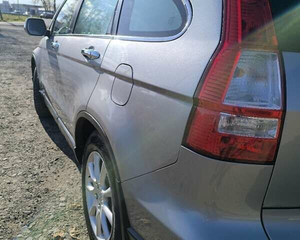 Серый Хонда СРВ, объемом двигателя 2.2 л и пробегом 285 тыс. км за 8999 $, фото 1 на Automoto.ua