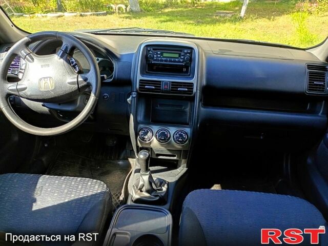 Сірий Хонда СРВ, об'ємом двигуна 2.2 л та пробігом 270 тис. км за 5000 $, фото 6 на Automoto.ua