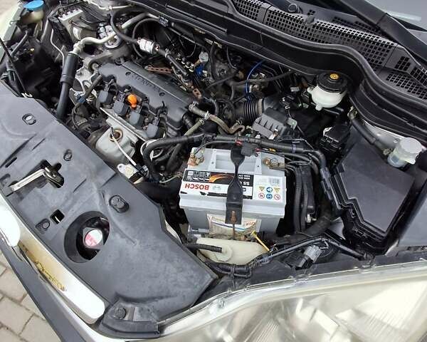 Серый Хонда СРВ, объемом двигателя 2 л и пробегом 240 тыс. км за 8200 $, фото 2 на Automoto.ua