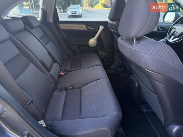 Серый Хонда СРВ, объемом двигателя 2 л и пробегом 260 тыс. км за 10600 $, фото 22 на Automoto.ua