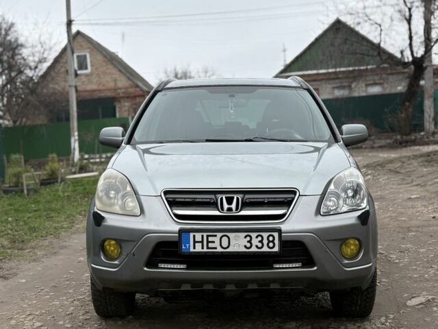 Серый Хонда СРВ, объемом двигателя 2.2 л и пробегом 999 тыс. км за 4700 $, фото 1 на Automoto.ua