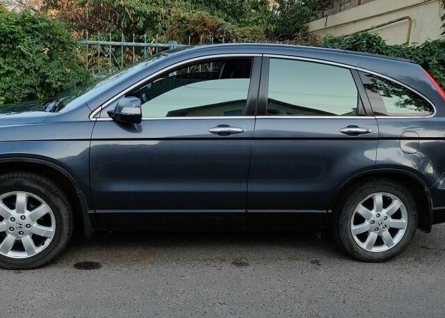 Серый Хонда СРВ, объемом двигателя 2 л и пробегом 218 тыс. км за 7800 $, фото 2 на Automoto.ua