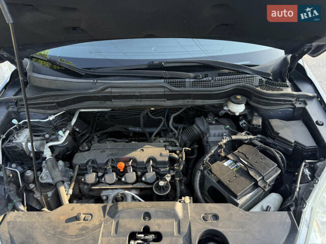 Серый Хонда СРВ, объемом двигателя 2 л и пробегом 260 тыс. км за 10600 $, фото 24 на Automoto.ua