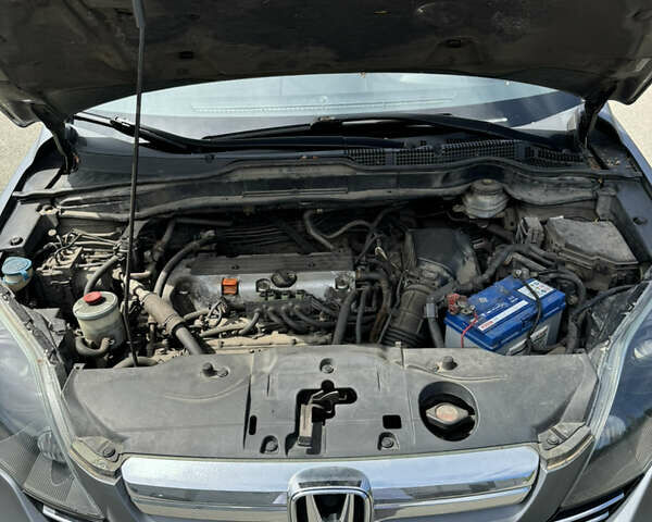 Серый Хонда СРВ, объемом двигателя 2.35 л и пробегом 300 тыс. км за 8500 $, фото 7 на Automoto.ua