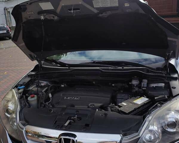 Серый Хонда СРВ, объемом двигателя 2.2 л и пробегом 240 тыс. км за 9900 $, фото 9 на Automoto.ua