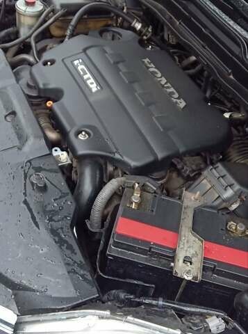 Серый Хонда СРВ, объемом двигателя 2.2 л и пробегом 232 тыс. км за 11000 $, фото 7 на Automoto.ua