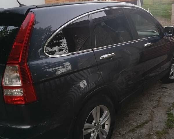 Серый Хонда СРВ, объемом двигателя 2.2 л и пробегом 214 тыс. км за 10500 $, фото 3 на Automoto.ua