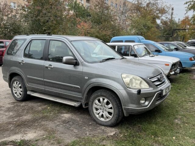 Серый Хонда СРВ, объемом двигателя 2.2 л и пробегом 170 тыс. км за 3400 $, фото 1 на Automoto.ua