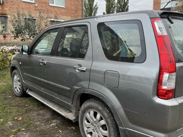 Серый Хонда СРВ, объемом двигателя 2.2 л и пробегом 170 тыс. км за 3400 $, фото 3 на Automoto.ua