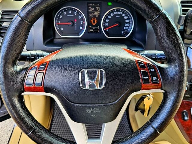 Серый Хонда СРВ, объемом двигателя 2.3 л и пробегом 241 тыс. км за 10850 $, фото 6 на Automoto.ua