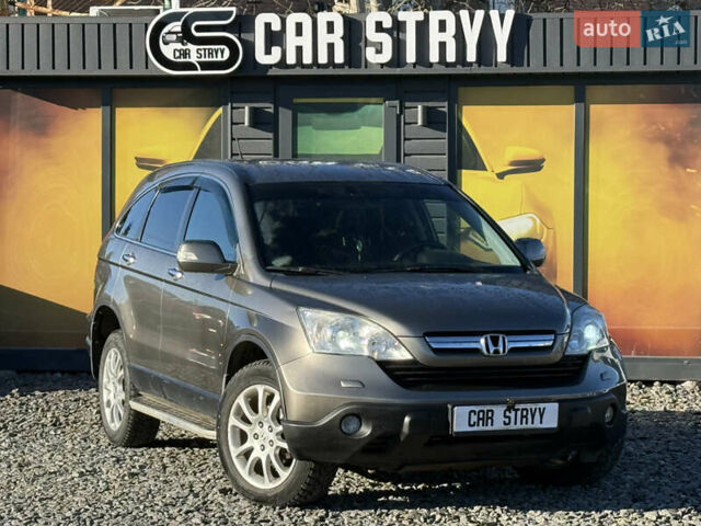 Серый Хонда СРВ, объемом двигателя 2.4 л и пробегом 214 тыс. км за 9500 $, фото 1 на Automoto.ua