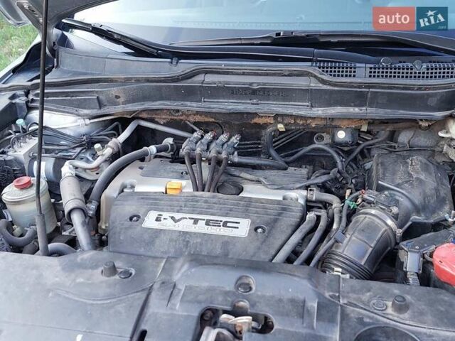 Серый Хонда СРВ, объемом двигателя 2.35 л и пробегом 221 тыс. км за 11000 $, фото 15 на Automoto.ua