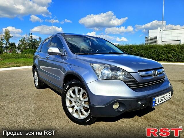 Серый Хонда СРВ, объемом двигателя 2.3 л и пробегом 241 тыс. км за 10850 $, фото 1 на Automoto.ua