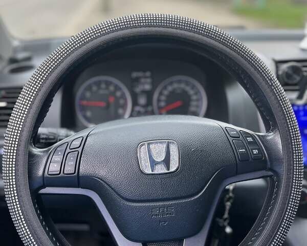 Серый Хонда СРВ, объемом двигателя 2 л и пробегом 174 тыс. км за 11200 $, фото 3 на Automoto.ua