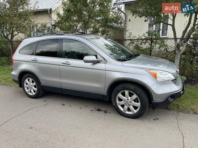 Серый Хонда СРВ, объемом двигателя 2.4 л и пробегом 200 тыс. км за 10000 $, фото 1 на Automoto.ua