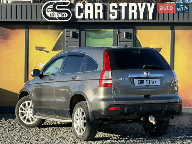 Серый Хонда СРВ, объемом двигателя 2.4 л и пробегом 214 тыс. км за 9500 $, фото 2 на Automoto.ua