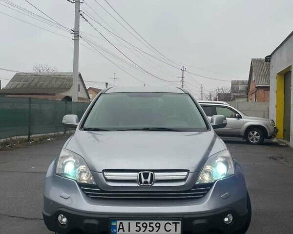 Серый Хонда СРВ, объемом двигателя 2.4 л и пробегом 222 тыс. км за 9300 $, фото 1 на Automoto.ua