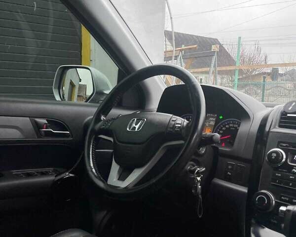 Серый Хонда СРВ, объемом двигателя 2.4 л и пробегом 222 тыс. км за 9300 $, фото 7 на Automoto.ua