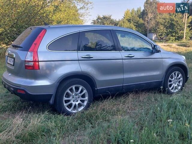 Серый Хонда СРВ, объемом двигателя 2.35 л и пробегом 221 тыс. км за 11000 $, фото 2 на Automoto.ua