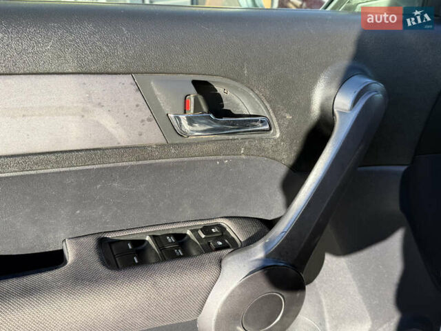 Серый Хонда СРВ, объемом двигателя 2.4 л и пробегом 214 тыс. км за 9500 $, фото 36 на Automoto.ua