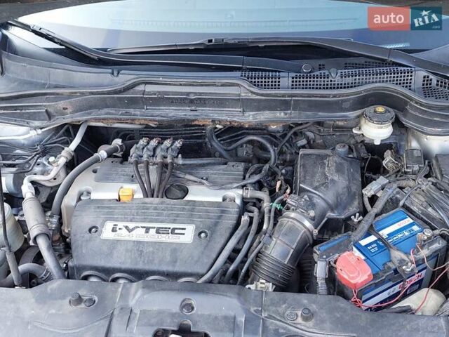 Серый Хонда СРВ, объемом двигателя 2.35 л и пробегом 221 тыс. км за 11000 $, фото 16 на Automoto.ua