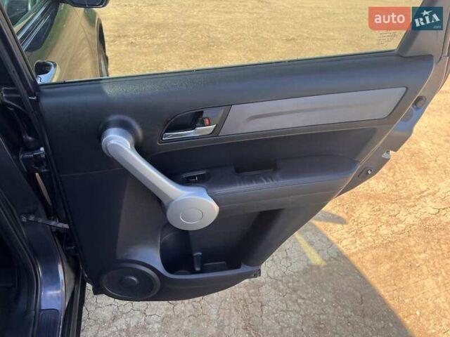 Серый Хонда СРВ, объемом двигателя 2.4 л и пробегом 228 тыс. км за 11150 $, фото 27 на Automoto.ua