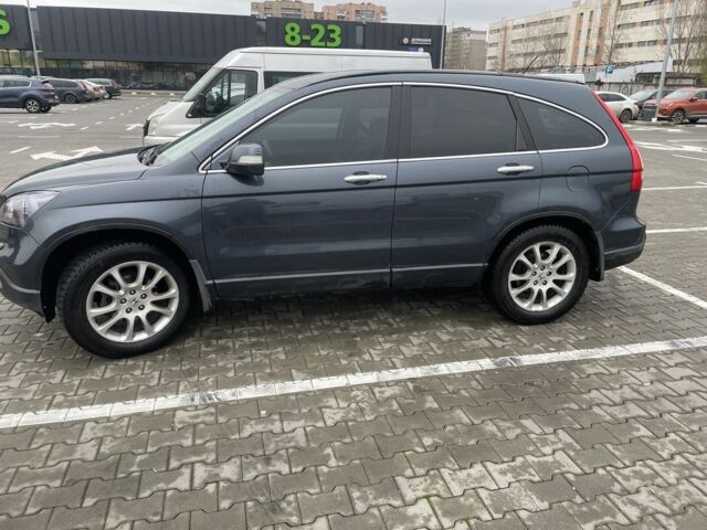 Серый Хонда СРВ, объемом двигателя 2.4 л и пробегом 215 тыс. км за 10200 $, фото 1 на Automoto.ua