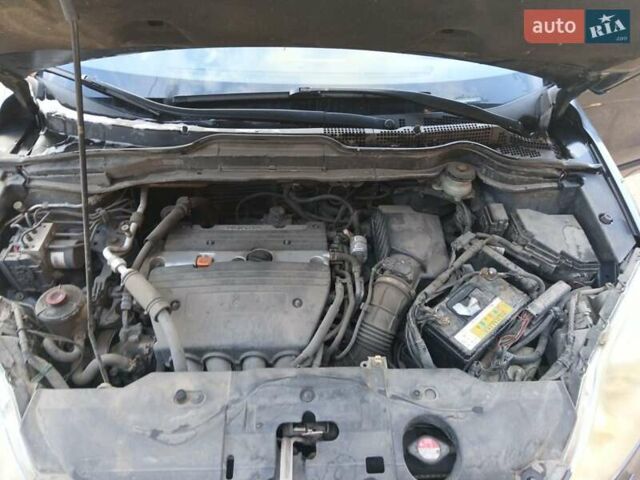 Серый Хонда СРВ, объемом двигателя 2.4 л и пробегом 218 тыс. км за 11500 $, фото 1 на Automoto.ua