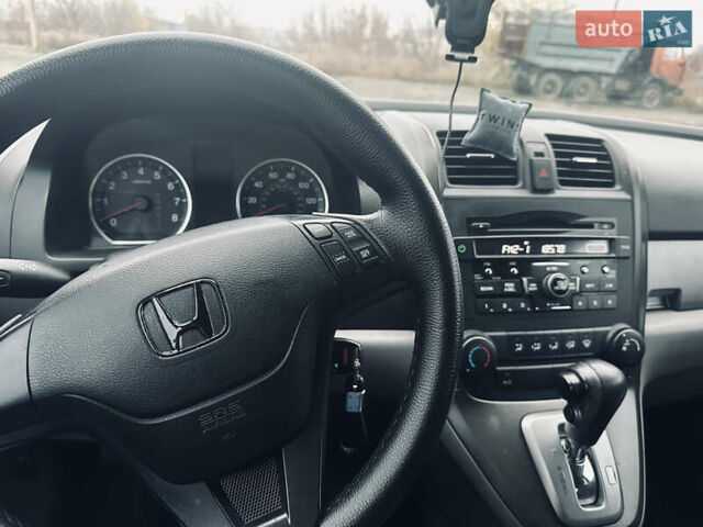 Серый Хонда СРВ, объемом двигателя 2.35 л и пробегом 179 тыс. км за 10900 $, фото 4 на Automoto.ua