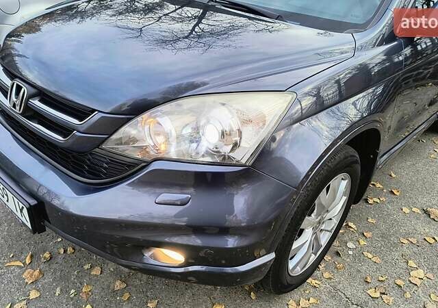 Серый Хонда СРВ, объемом двигателя 2 л и пробегом 230 тыс. км за 12500 $, фото 13 на Automoto.ua