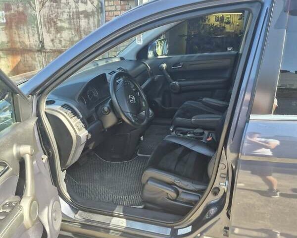 Серый Хонда СРВ, объемом двигателя 2.35 л и пробегом 178 тыс. км за 13600 $, фото 2 на Automoto.ua