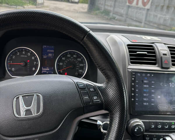 Серый Хонда СРВ, объемом двигателя 2.35 л и пробегом 190 тыс. км за 12300 $, фото 5 на Automoto.ua