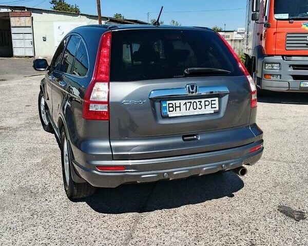 Серый Хонда СРВ, объемом двигателя 2.4 л и пробегом 213 тыс. км за 12500 $, фото 7 на Automoto.ua
