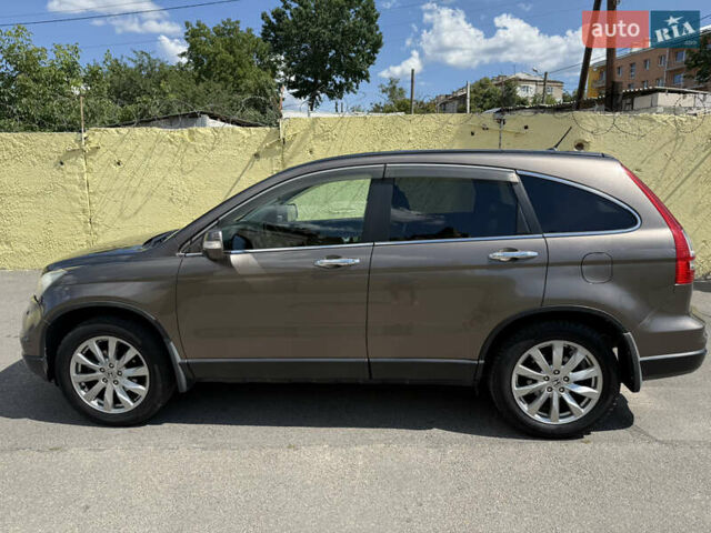 Серый Хонда СРВ, объемом двигателя 2.4 л и пробегом 160 тыс. км за 11000 $, фото 1 на Automoto.ua