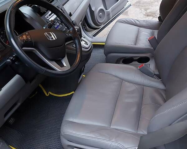 Серый Хонда СРВ, объемом двигателя 2.35 л и пробегом 150 тыс. км за 12500 $, фото 3 на Automoto.ua