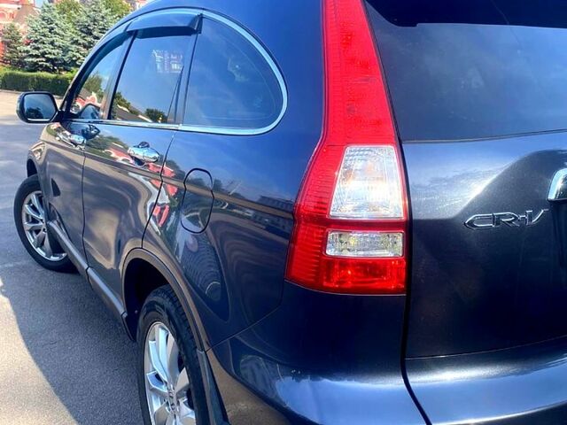 Серый Хонда СРВ, объемом двигателя 2.4 л и пробегом 179 тыс. км за 14500 $, фото 5 на Automoto.ua