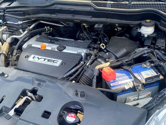 Серый Хонда СРВ, объемом двигателя 2.4 л и пробегом 179 тыс. км за 14500 $, фото 1 на Automoto.ua