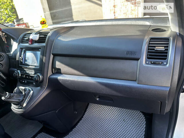 Серый Хонда СРВ, объемом двигателя 2.2 л и пробегом 202 тыс. км за 13000 $, фото 14 на Automoto.ua