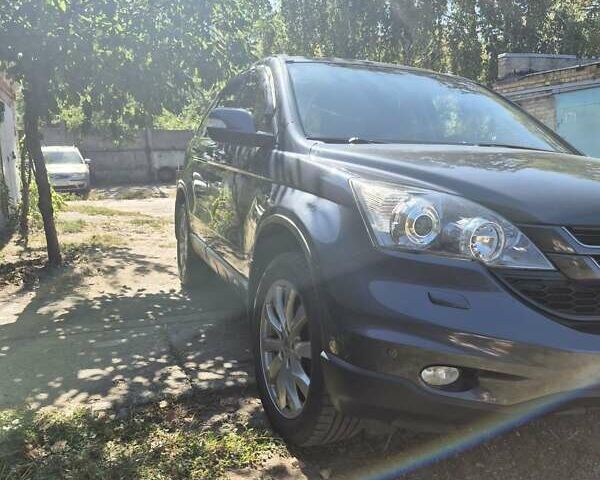 Серый Хонда СРВ, объемом двигателя 2.35 л и пробегом 178 тыс. км за 13600 $, фото 4 на Automoto.ua