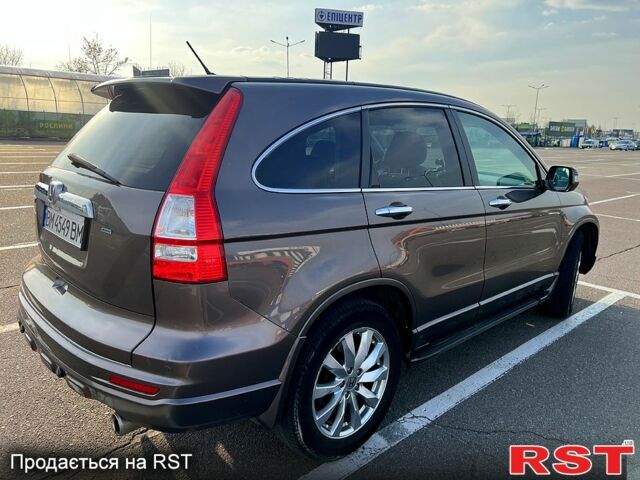 Серый Хонда СРВ, объемом двигателя 2.4 л и пробегом 262 тыс. км за 12500 $, фото 2 на Automoto.ua