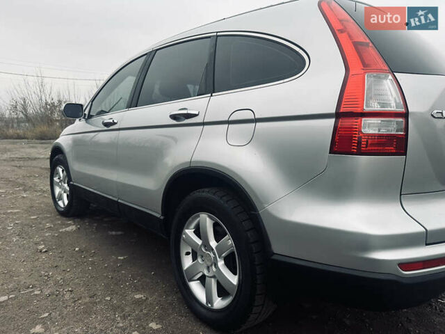 Серый Хонда СРВ, объемом двигателя 2.35 л и пробегом 179 тыс. км за 10900 $, фото 3 на Automoto.ua