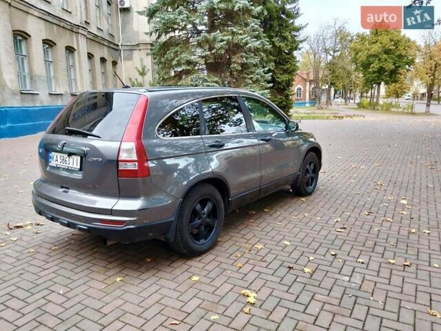 Серый Хонда СРВ, объемом двигателя 2.36 л и пробегом 204 тыс. км за 11000 $, фото 5 на Automoto.ua