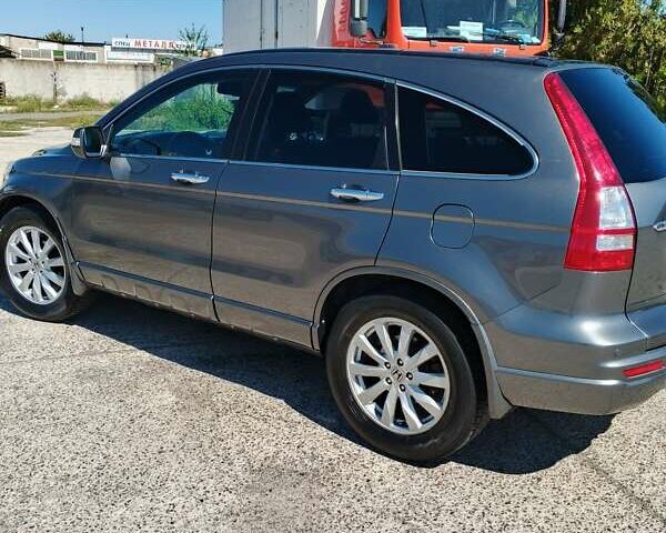 Серый Хонда СРВ, объемом двигателя 2.4 л и пробегом 213 тыс. км за 12500 $, фото 2 на Automoto.ua