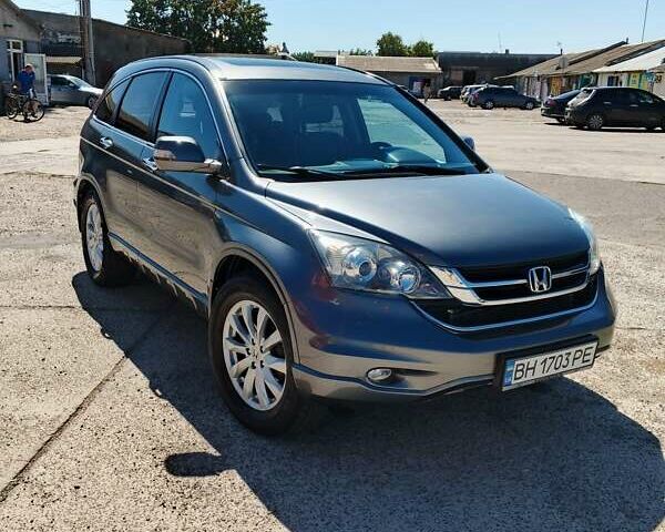 Серый Хонда СРВ, объемом двигателя 2.4 л и пробегом 213 тыс. км за 12500 $, фото 1 на Automoto.ua