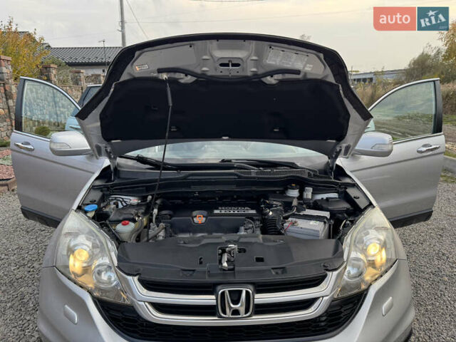 Серый Хонда СРВ, объемом двигателя 2.2 л и пробегом 246 тыс. км за 11850 $, фото 66 на Automoto.ua