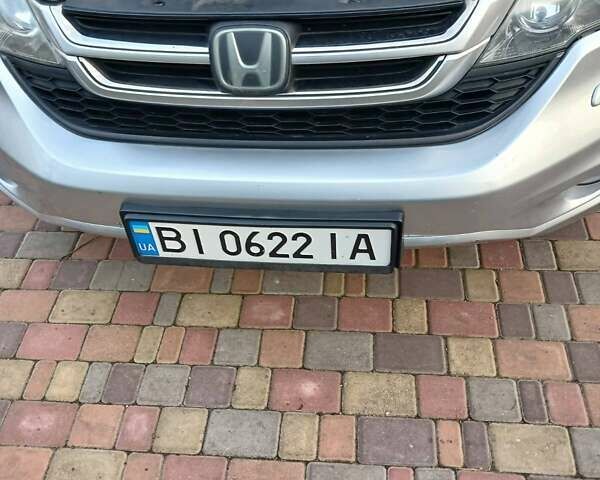 Серый Хонда СРВ, объемом двигателя 2.2 л и пробегом 266 тыс. км за 14500 $, фото 1 на Automoto.ua