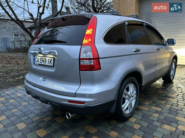 Серый Хонда СРВ, объемом двигателя 2 л и пробегом 300 тыс. км за 14500 $, фото 5 на Automoto.ua