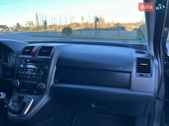 Сірий Хонда СРВ, об'ємом двигуна 2.2 л та пробігом 175 тис. км за 13999 $, фото 81 на Automoto.ua